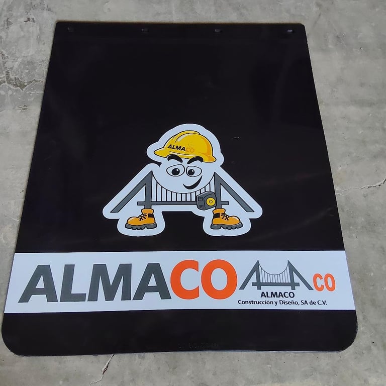 Black mud flap with ALMACO logo featuring cartoon construction worker character wearing yellow hard hat